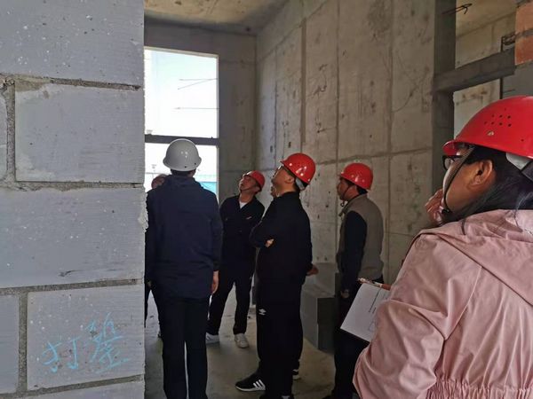 陜煤建設(shè)天工公司銅川項目部承建的富秦鑫苑5#樓 順利通過主體分部驗收